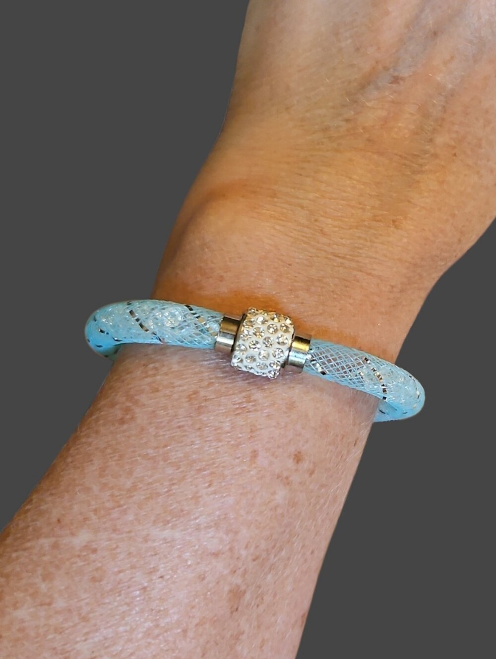 Crystal Accent Light Blue Stardust Metallic Mesh Bracelet